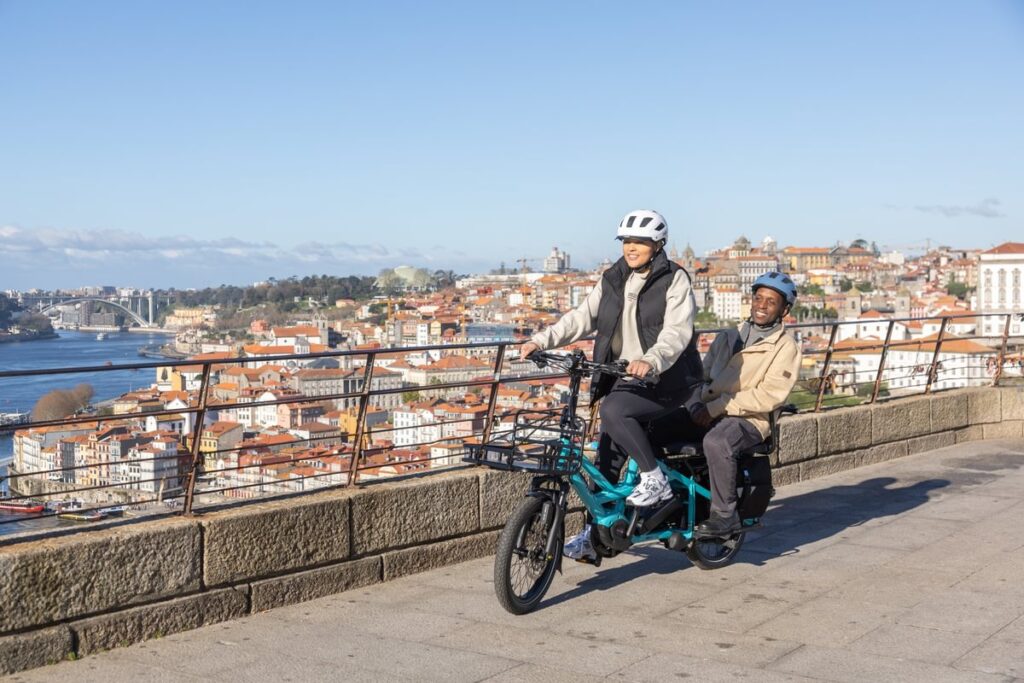 A Tern GSD Gen 3 cargo bike carrying an adult passenger