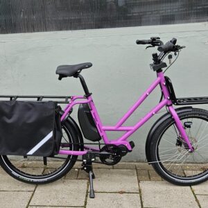Veloe Multi electric cargo bike in purple, side view, showing the low step-through frame, front rack and rear rack